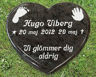 liggande gravsten hjärta